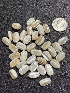 221.  Natural Mother Of Pearl Oval Shape Loose Beads